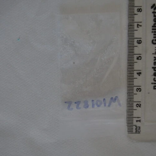 Cocaine pill — Caffeine; Amphetamine — Elmbridge; Runnymede (KT13), England