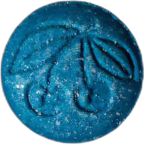 Tableta Cherry — MDMA (55mg); Caffeine (13mg) — Marseille, Francie