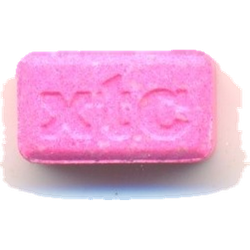 Pink XTC ecstasy pill (XTC) — MDMA 130mg; Amphetamine 232.14 mg; Caffeine 96.36 mg; DPIA — Barcelona, Spain
