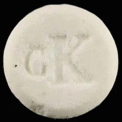 White Louis Vuitton ecstasy pill (XTC) — Caffeine 82mg — Zürich, Switzerland