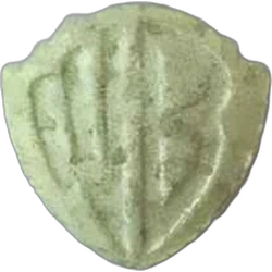 Green Warner Bros ecstasy pill (XTC) — MDMA 103mg — Barcelona, Spain