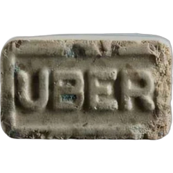 Grey Uber Eats ecstasy pill (XTC) — MDMA 83mg; Synthesis impurity — Zürich, Switzerland