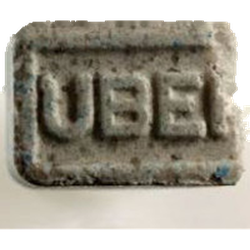 Grey Uber Eats ecstasy pill (XTC) — MDMA 61mg; Synthesis impurity — Zürich, Switzerland