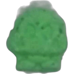 Green Goomba pill — Caffeine 1mg; 2C-B 7mg; Amphetamine 1mg — Madrid, Spain