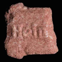 Brown Heineken ecstasy pill (XTC) — 4-CMC 138mg; Unidentified — Bern, Switzerland