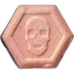 Orange Philipp Plein ecstasy pill (XTC) — MDMA 280mg — Madrid, Spain