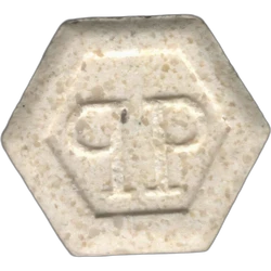 Yellow Philipp Plein ecstasy pill (XTC) — MDMA 140mg; Caffeine 4mg — Barcelona, Spain