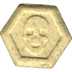 Yellow Philipp Plein ecstasy pill (XTC) — MDMA 178mg — Barcelona, Spain
