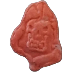 Orange Grim Reaper ecstasy pill (XTC) — MDMA 159mg — Granada, Spain