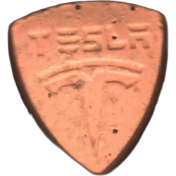 Orange Tesla ecstasy pill (XTC) — MDMA 166mg — Barcelona, Spain