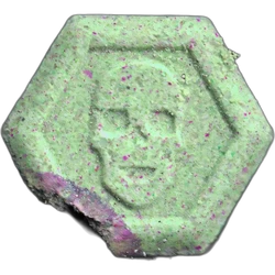 Green Philipp Plein ecstasy pill (XTC) — MDMA 231mg — Madrid, Spain
