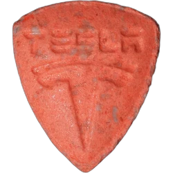 Orange Tesla ecstasy pill (XTC) — MDMA — Zürich, Switzerland
