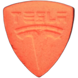 Orange Tesla ecstasy pill (XTC) — MDMA 125mg — Barcelona, Spain