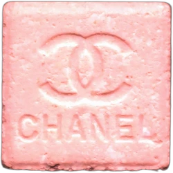 Pill Chanel — MDMA 1mg; Caffeine 3mg; Amphetamine 5mg; 3-CMC — Barcelona, Spain
