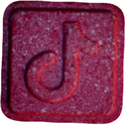 Red TikTok ecstasy pill (XTC) — MDMA 18mg; Caffeine 186mg — Vienna, Austria