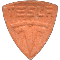Orange Tesla ecstasy pill (XTC) — MDMA 142mg — Madrid, Spain
