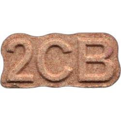 White 2C-B pill — 2C-B 7mg; Synthesis impurity — Madrid, Spain