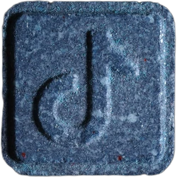 Blue TikTok ecstasy pill (XTC) — Caffeine 255mg; Amphetamine 1mg — Luzern, Switzerland
