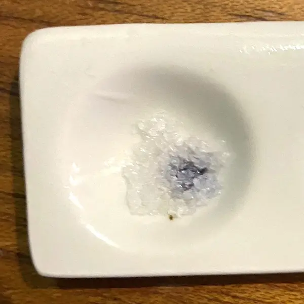 Using a small LSD sample — for example, 1/8 of a blotter (a piece of blotter paper, commonly referred to simply as a "blotter") — usually results in a weaker reaction. It may appear grayish-blue. It's important to remember that the intensity of the reaction is not particularly significant. Even if only the sample itself changes color as described, it still clearly indicates a positive result.