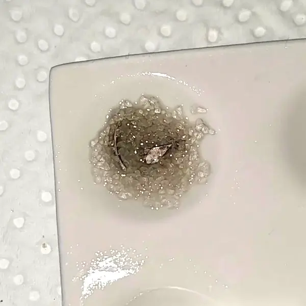 Thanks to members of the reddit.com/r/reagenttesting community, it was discovered that some blotters contain an unidentified substance that causes a brown reaction with the Hofmann reagent. Together with user /u/Ok-Bedroom495, we found a solution to this issue. Before applying the Hofmann reagent, simply soak the sample in a small amount of alcohol, or add 1–2 drops of alcohol just before adding the reagent. This way, the reagent will almost instantly produce the expected dark blue color.