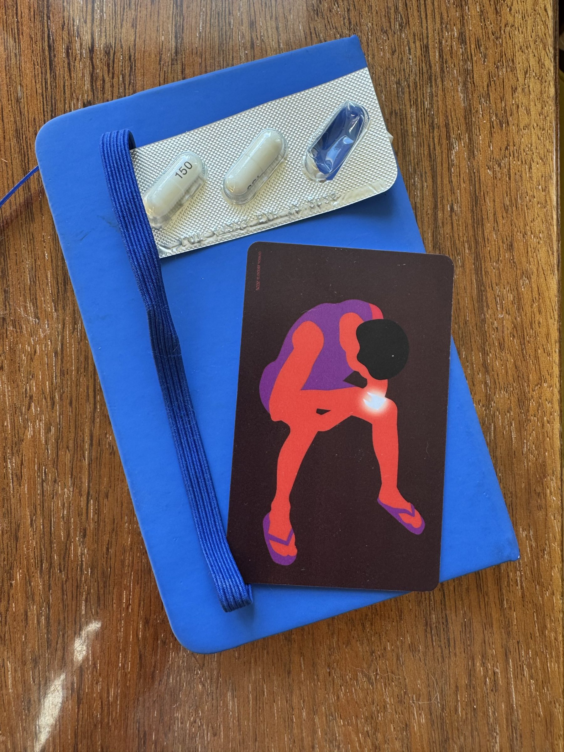 Pregabalin blister and Drugstore harm reduction material on a table