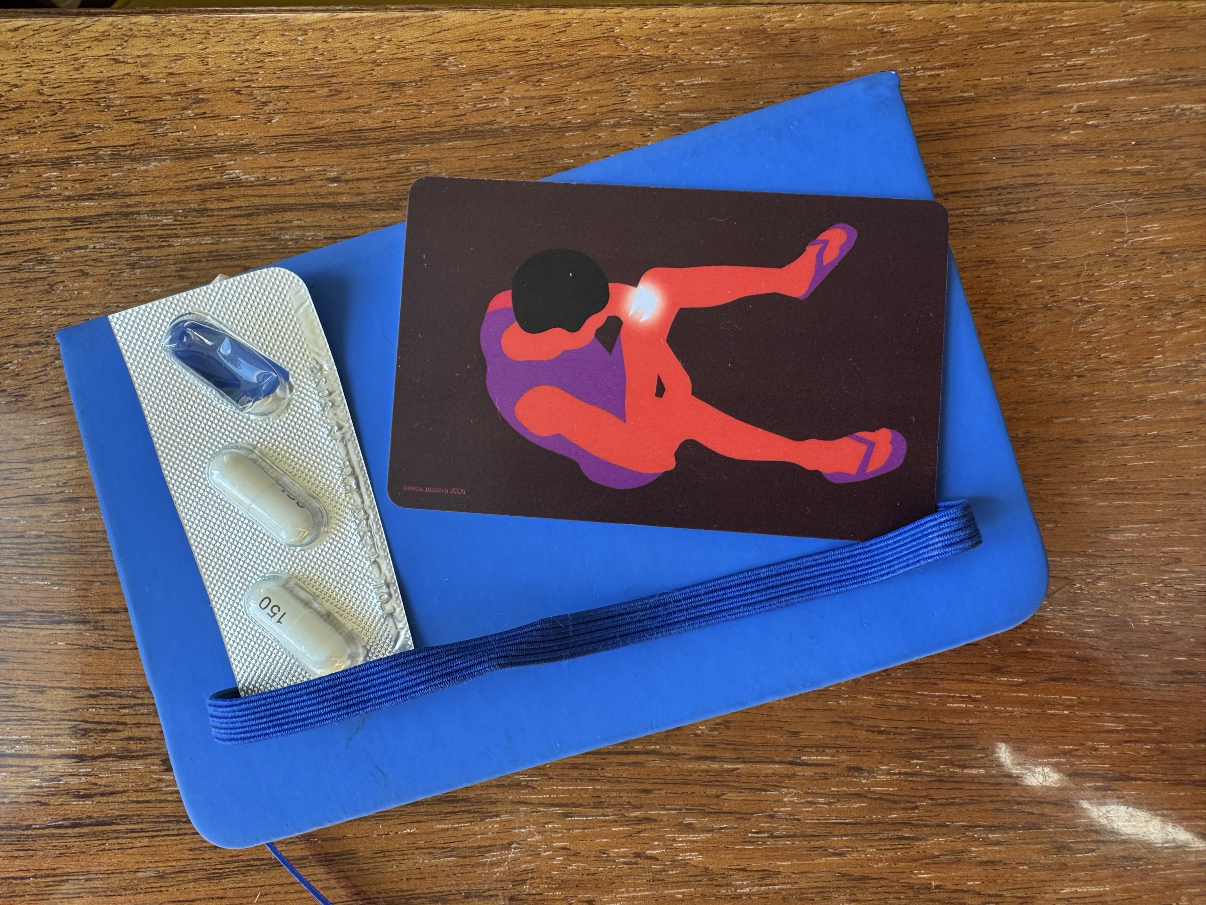 Pregabalin blister and Drugstore harm reduction material on a table