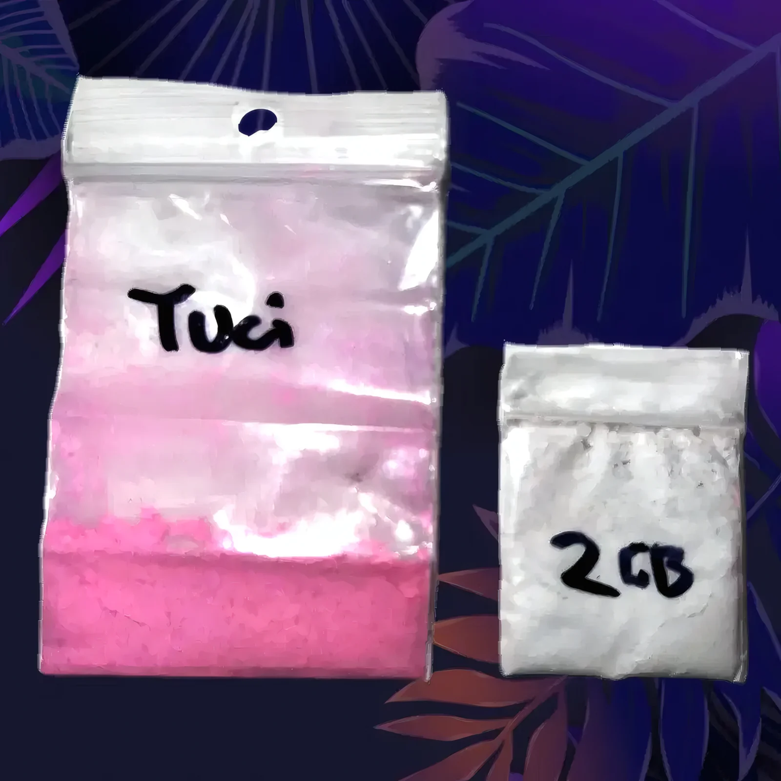 Bags of pink tusi powder and white 2C-B powder