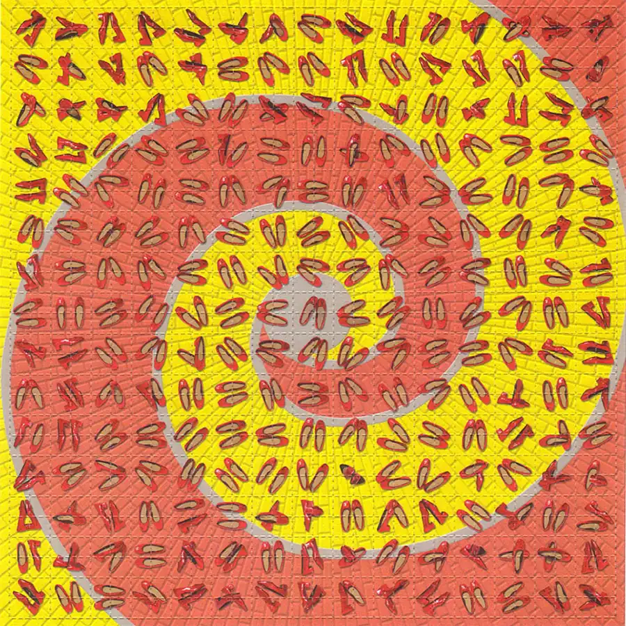 A full sheet of LSD blotter paper printed with a red and yellow spiral design