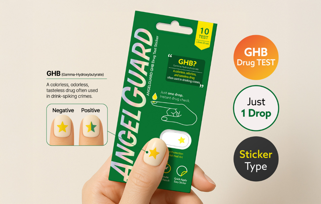 Die AngelGuard-Verpackung wird neben einen Fingernagel gehalten, auf dem ein sternförmiger Testaufkleber angebracht ist