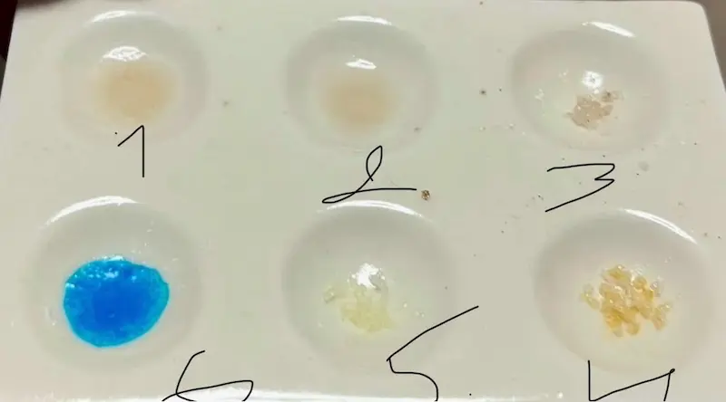 Clean cocaine tested with six reagents, Morris blue and Liebermann yellow